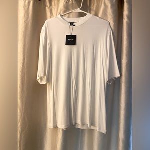 White shirt new with tags smoke free and pet free home.